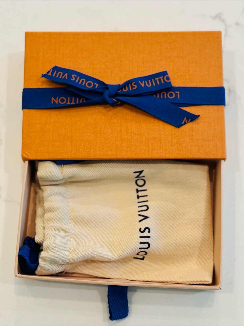 Louis Vuitton Small Orange Box with Blue Logo Ribbon. Include dust bag. Unused!